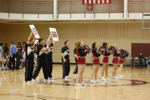 Holy Cross male and female cheerleaders