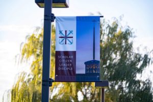 Close up of the SCLD flag banner on the light post
