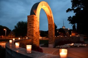 Arch with lit candles