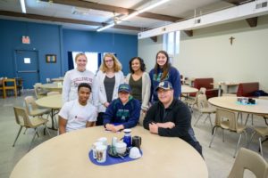 Students working at the Catholic Worker House