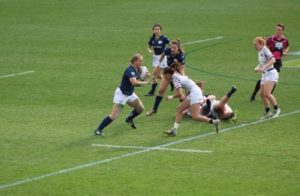 Student Tori Jones playing on the rugby field.