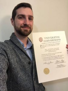 Paul Gilsdorf ’18, holding his degree from Harvard.