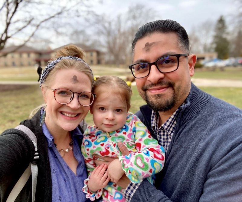 Melonie Mulkey, Angelo Ray Martínez, and their daughter Ava on Ash Wednesday, 2022.