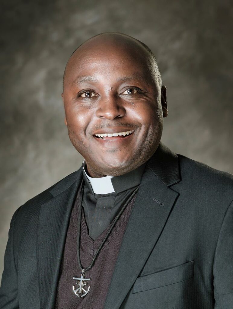 Pictured is Father Fred Jenga, C.S.C.